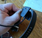 Fitbit Charge 2 with device mounted in the charging clip